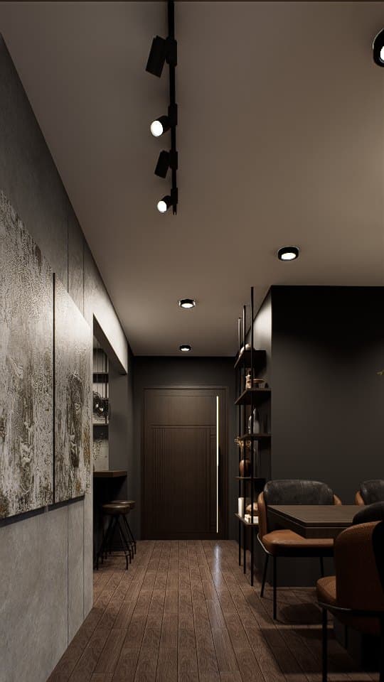 An entry corridor with concealed wardrobe doors and a calm tonal palette opening into the living room.
