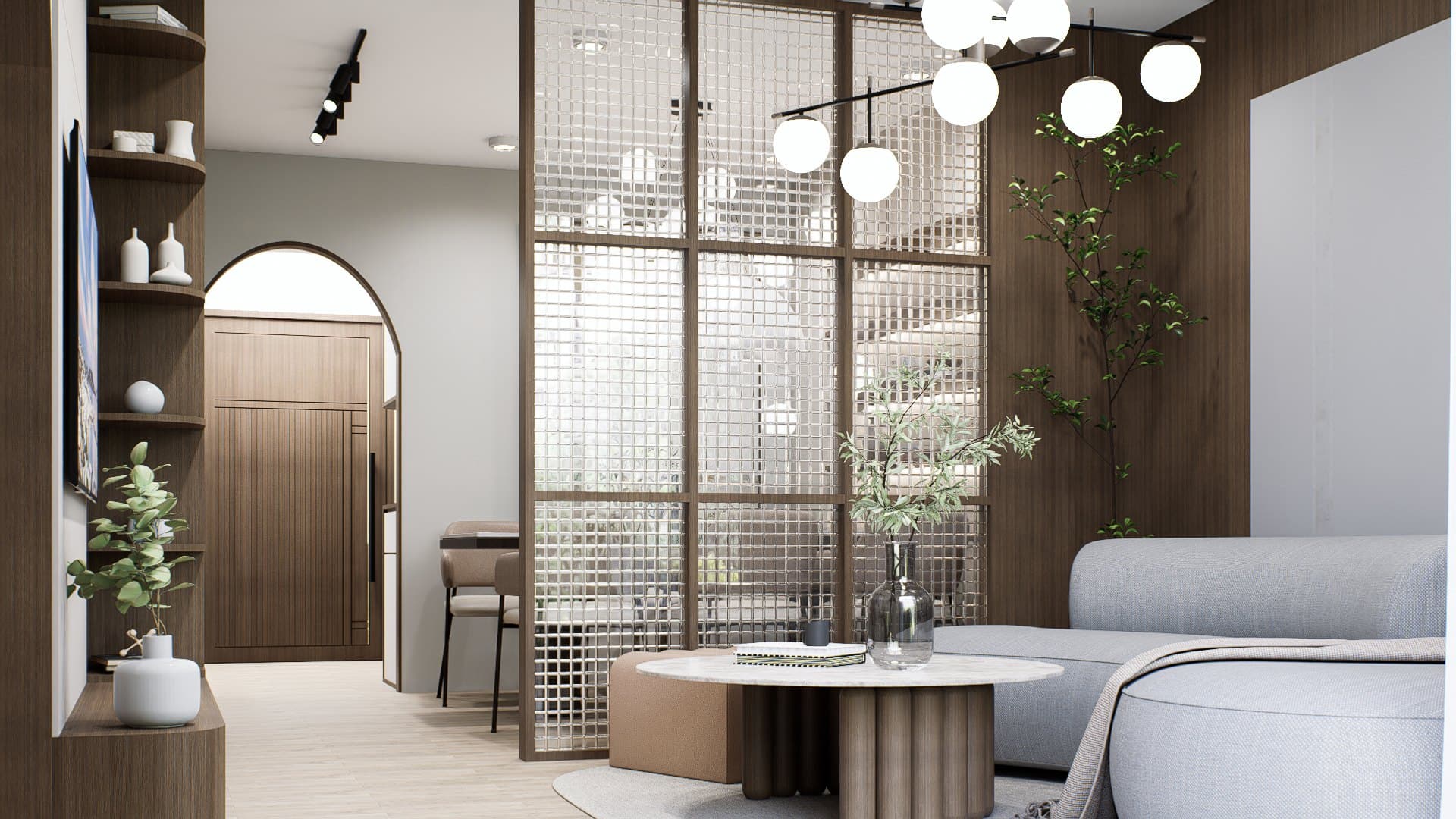 A living room framed by a feature wall and curved seating, with soft cove lighting overhead.