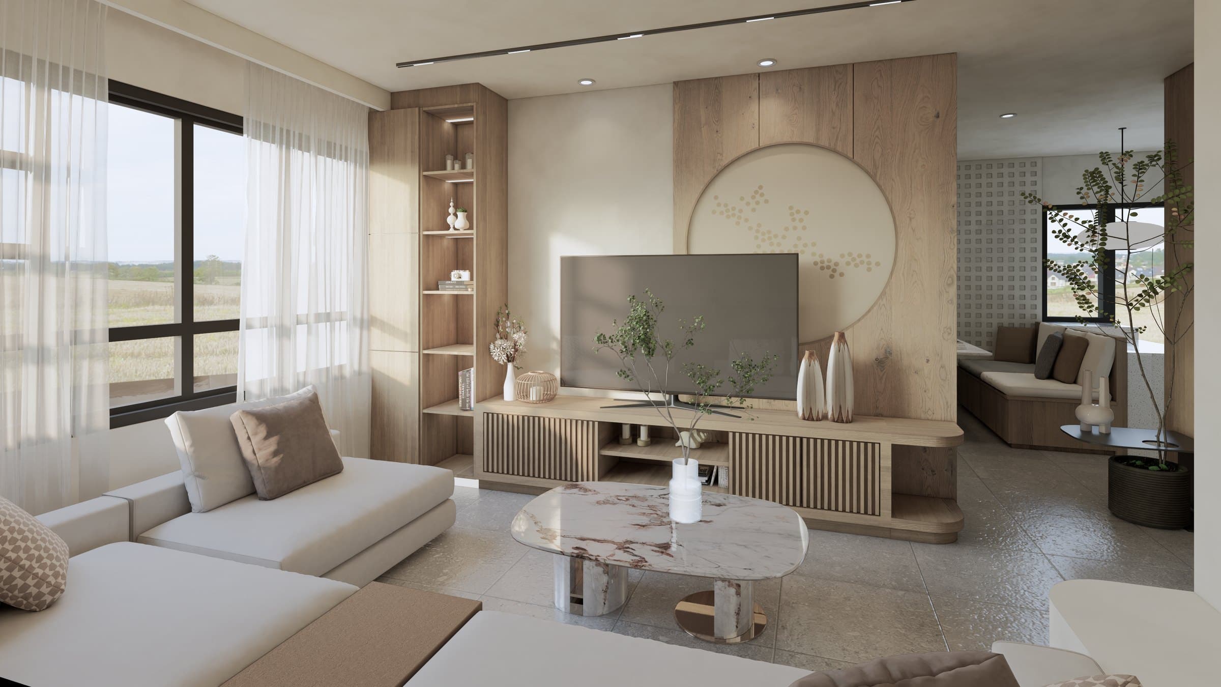 A living room arranged around a sectional sofa and feature TV wall, with cove lighting and tonal styling.