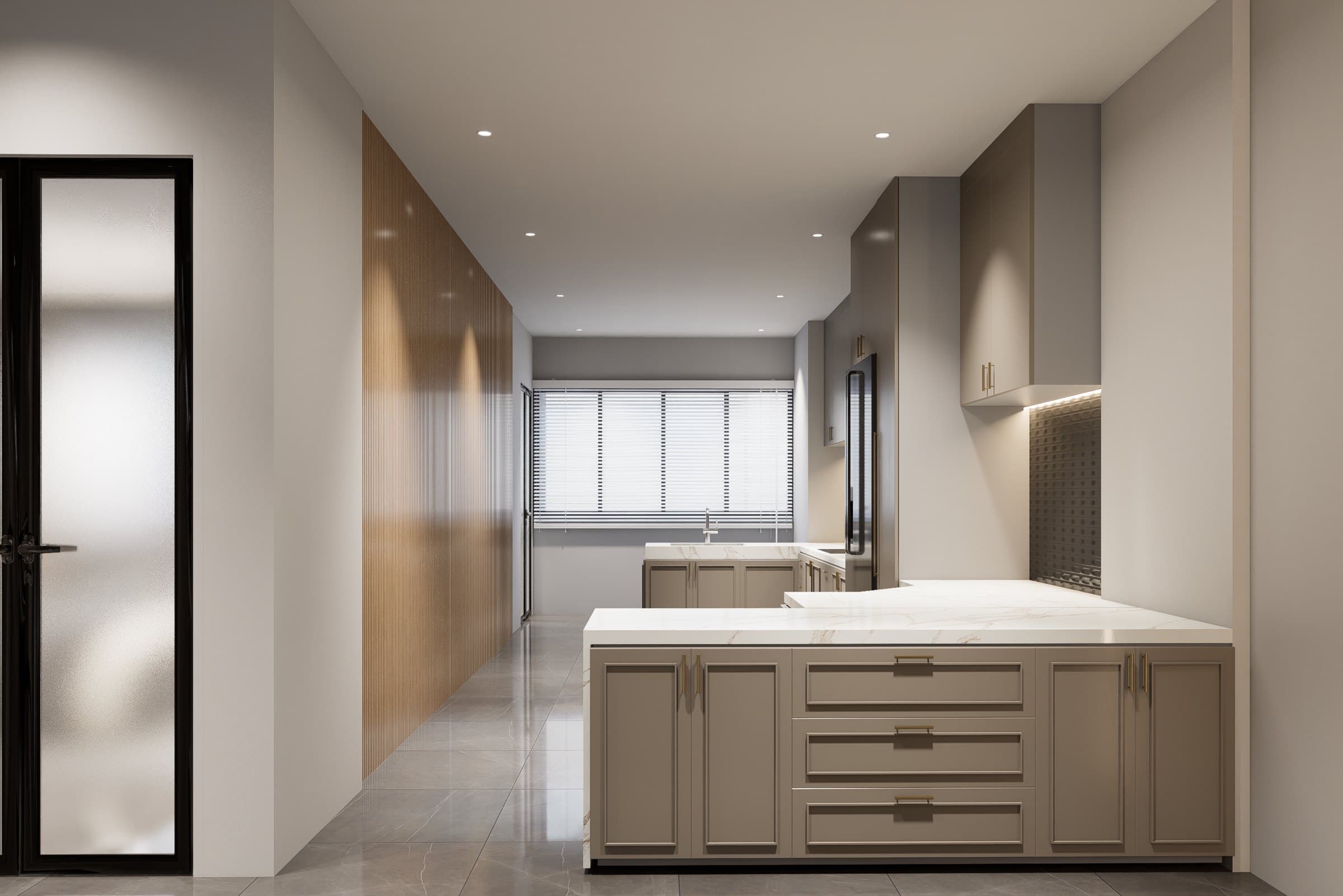 A galley kitchen with quartz counters, concealed tall storage and warm overhead lighting.