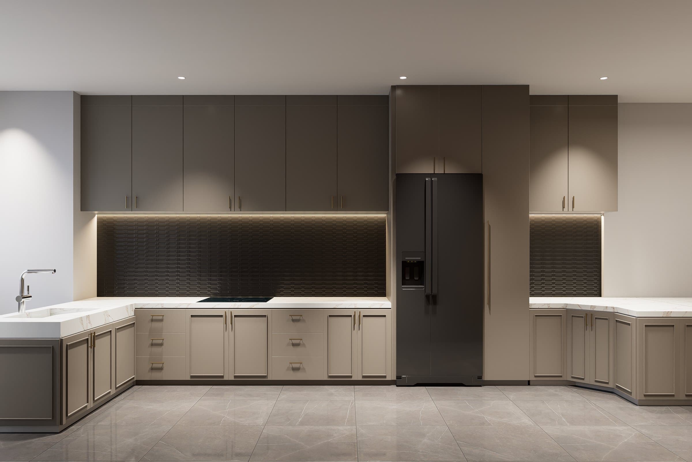 A galley kitchen with quartz counters, concealed tall storage and warm overhead lighting.