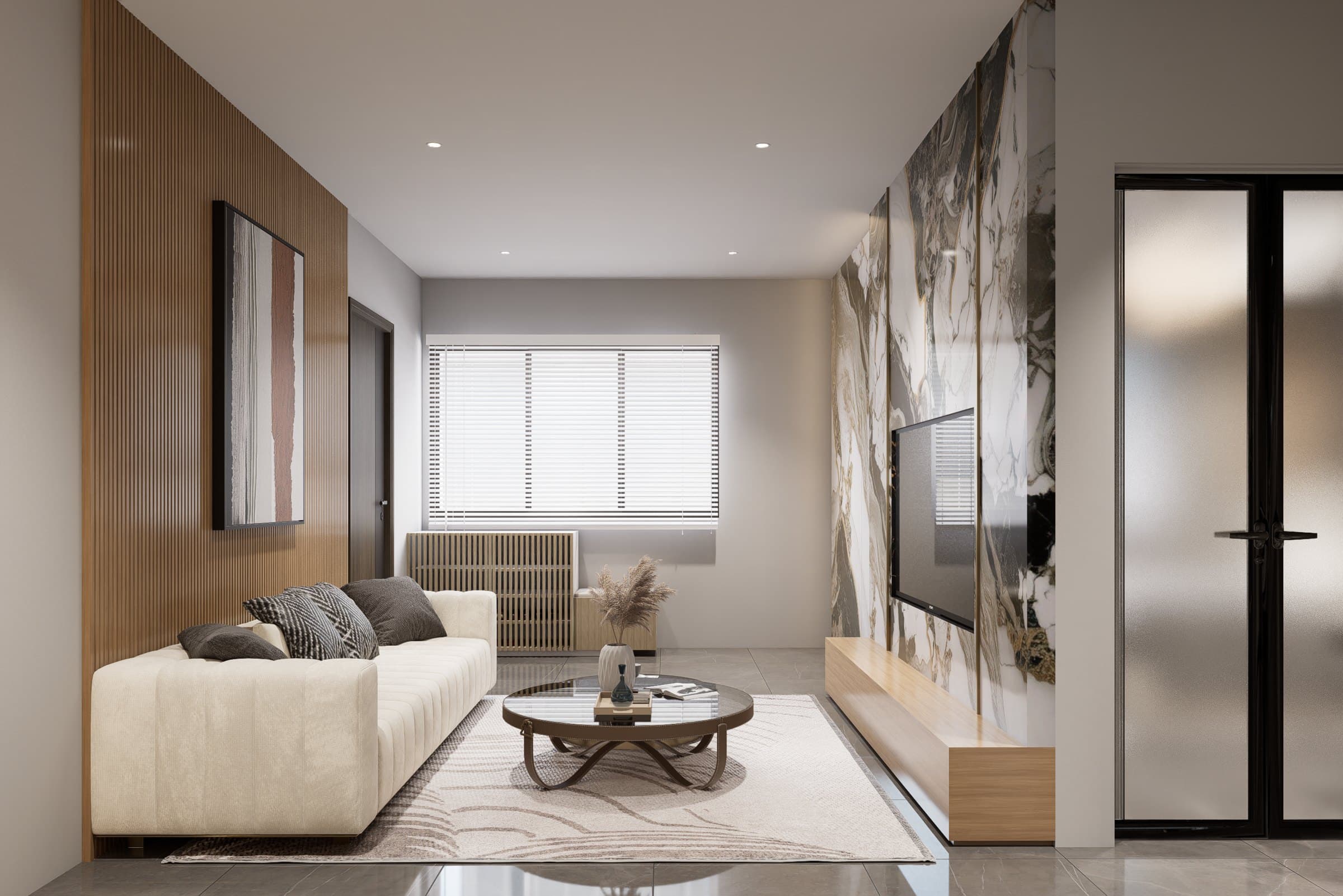 A living room framed by a feature wall and curved seating, with soft cove lighting overhead.