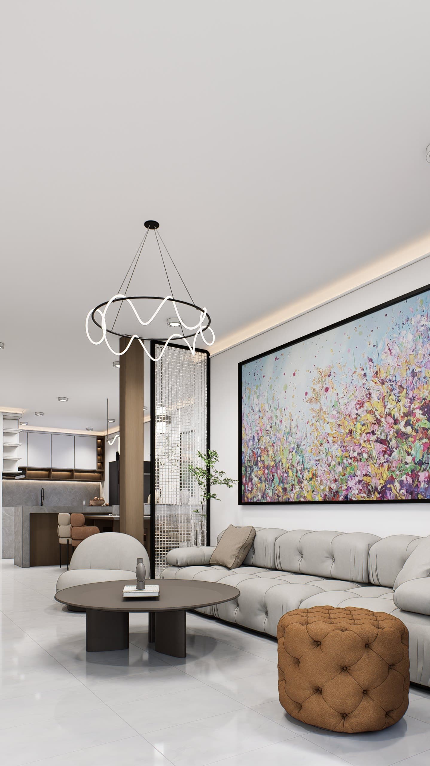 A living room framed by a feature wall and curved seating, with soft cove lighting overhead.
