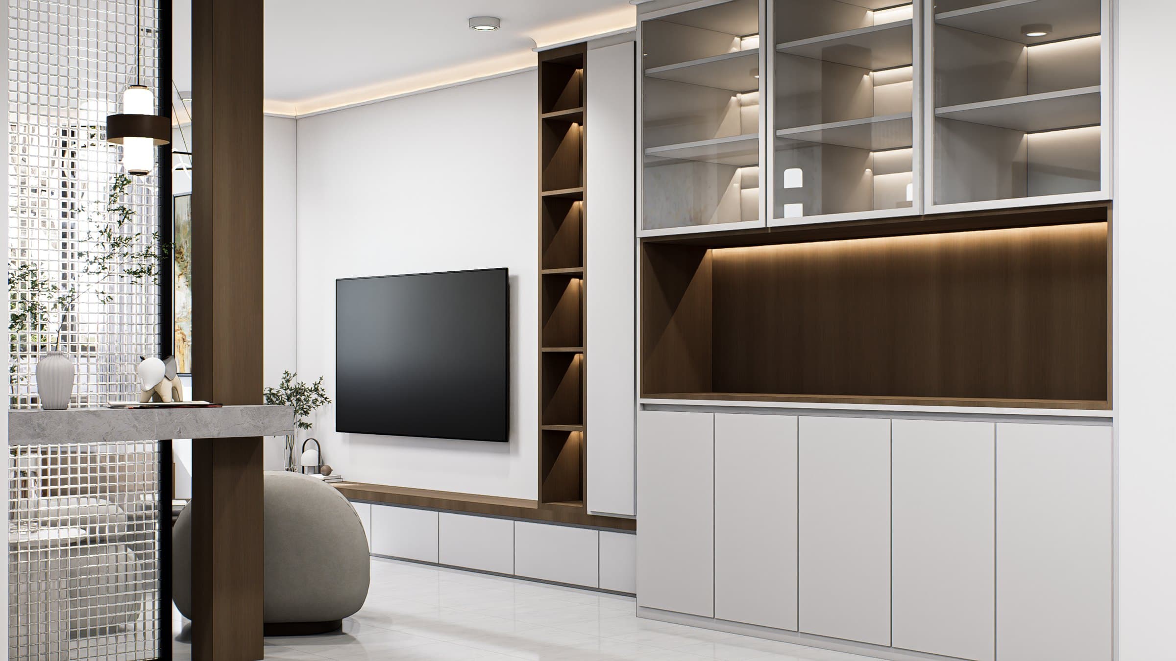 A living room framed by a feature wall and curved seating, with soft cove lighting overhead.