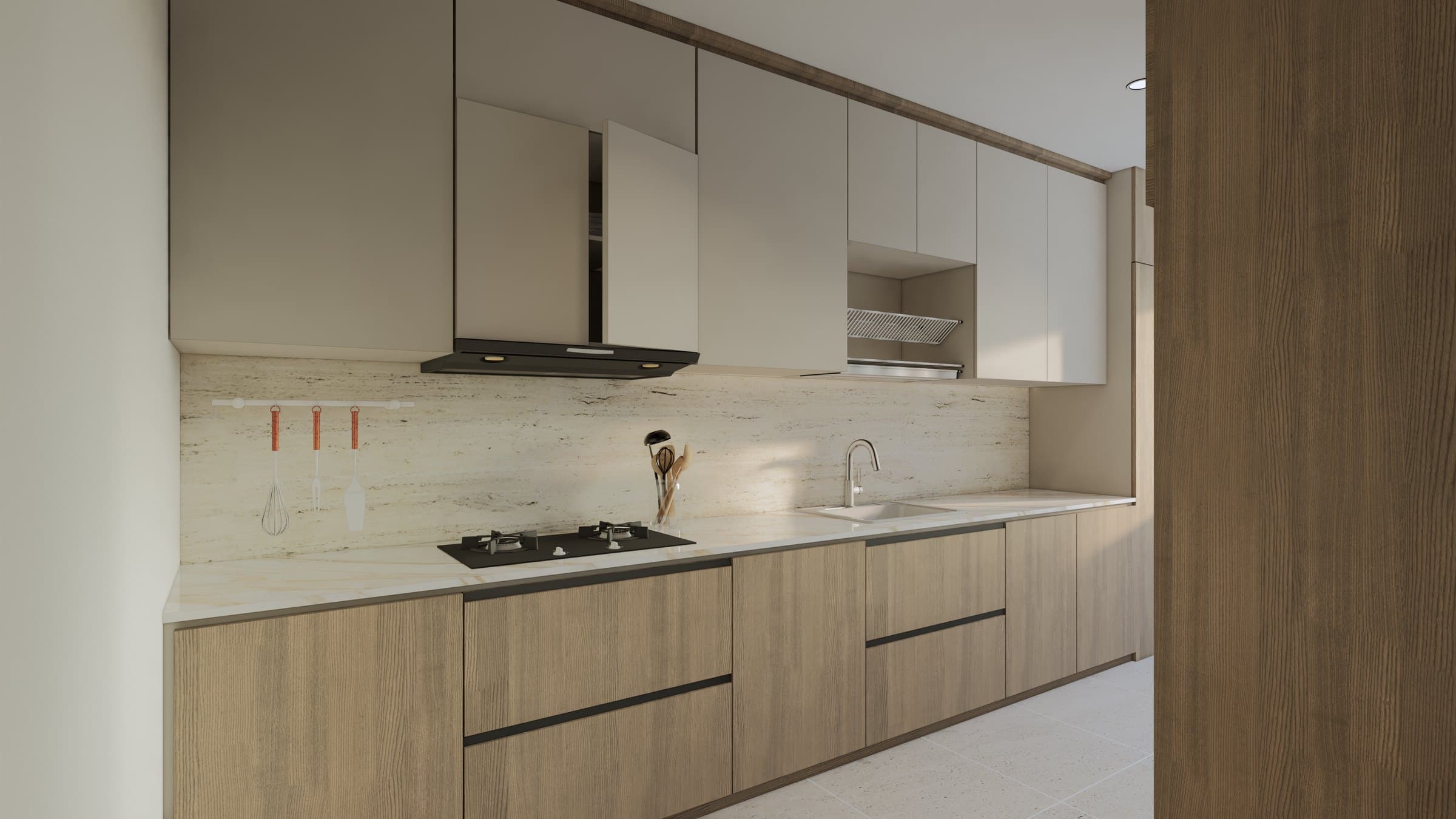 A galley kitchen with quartz counters, concealed tall storage and warm overhead lighting.