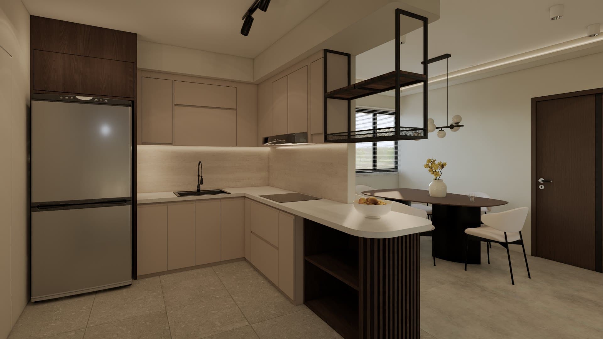 A galley kitchen with quartz counters, concealed tall storage and warm overhead lighting.