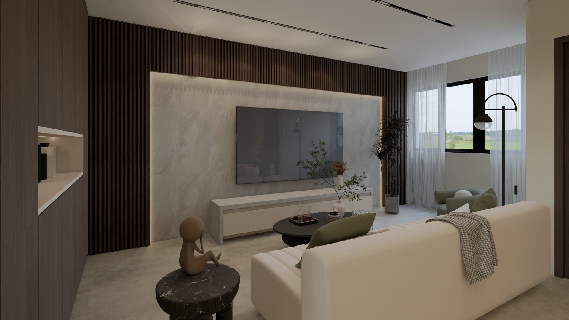 A living room arranged around a sectional sofa and feature TV wall, with cove lighting and tonal styling.