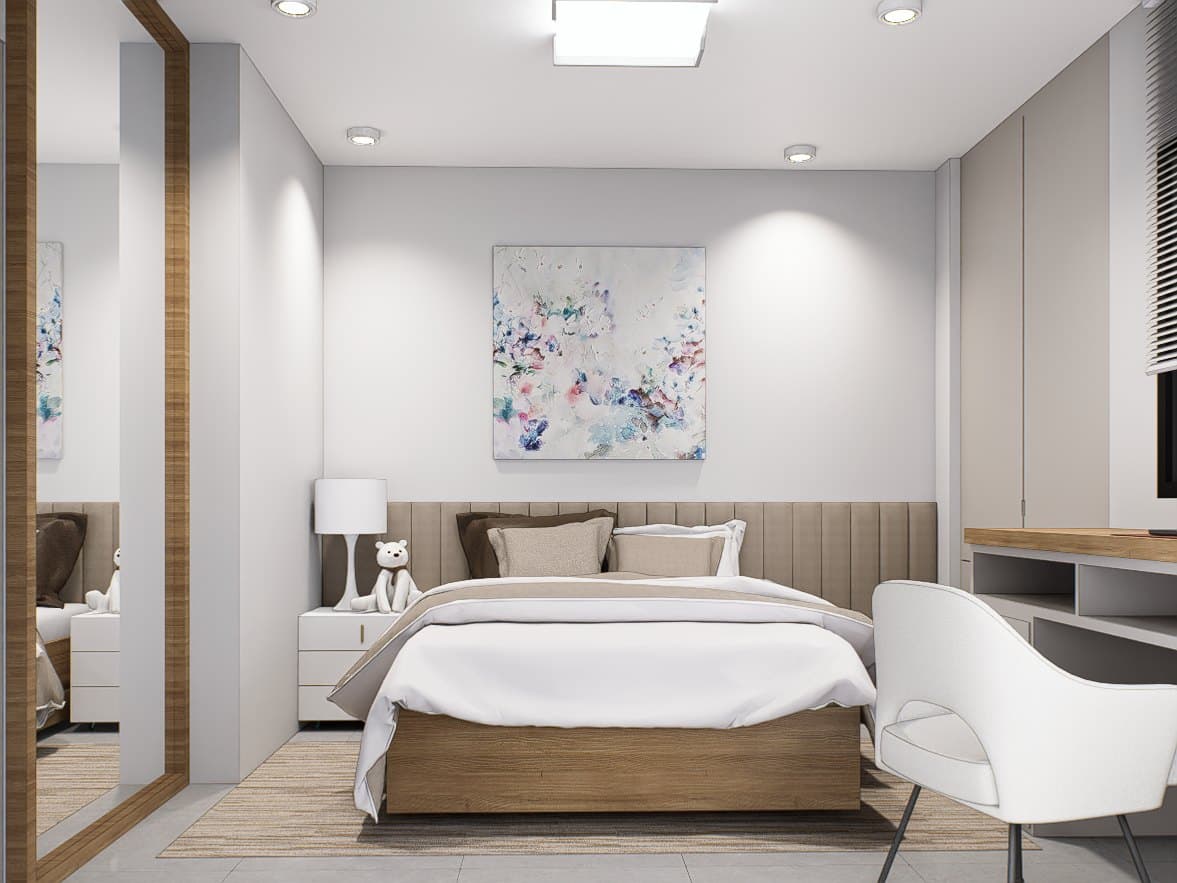A bedroom in a calm tonal palette, dressed with a platform bed, built-in wardrobe and quiet bedside styling.