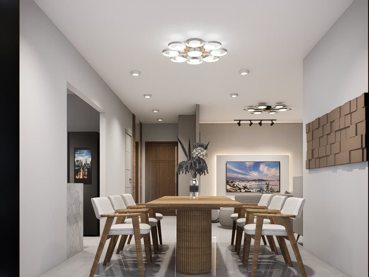 A dining setting under a sculptural pendant, anchored by an oak table and tonal seating.