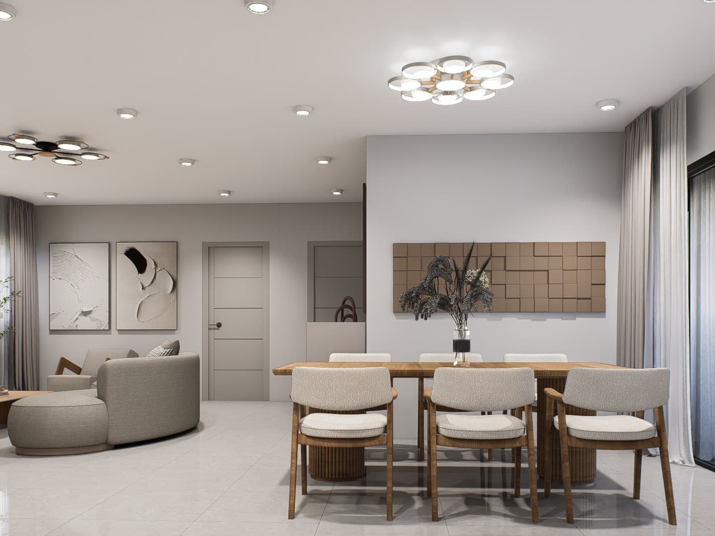 A dining setting under a sculptural pendant, anchored by an oak table and tonal seating.