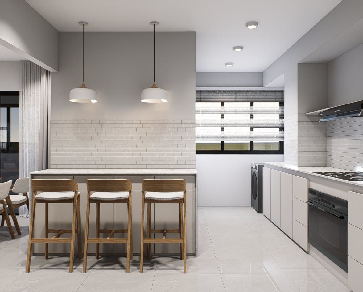 A galley kitchen with quartz counters, concealed tall storage and warm overhead lighting.
