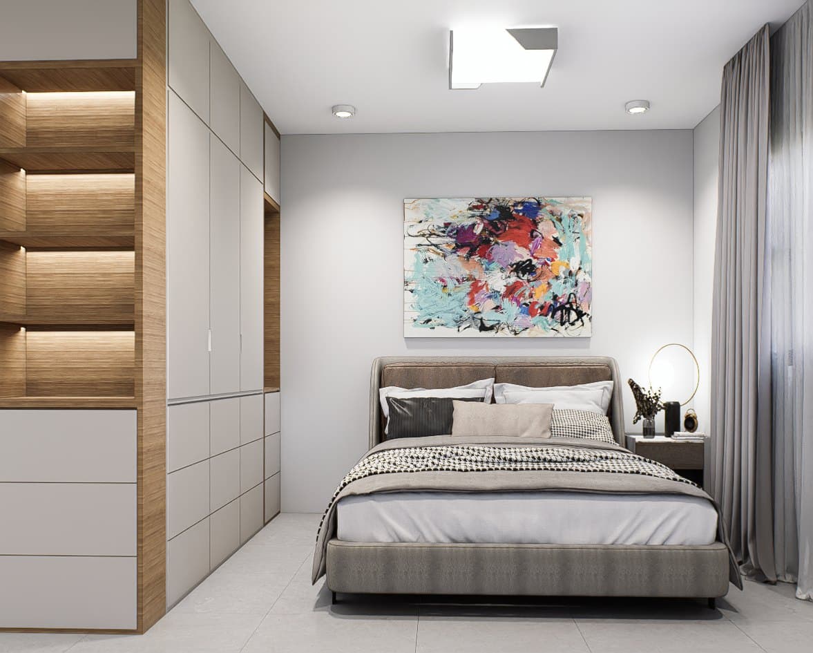 A master bedroom framed by a panelled headboard wall, paired with a platform bed and tonal bedside styling.