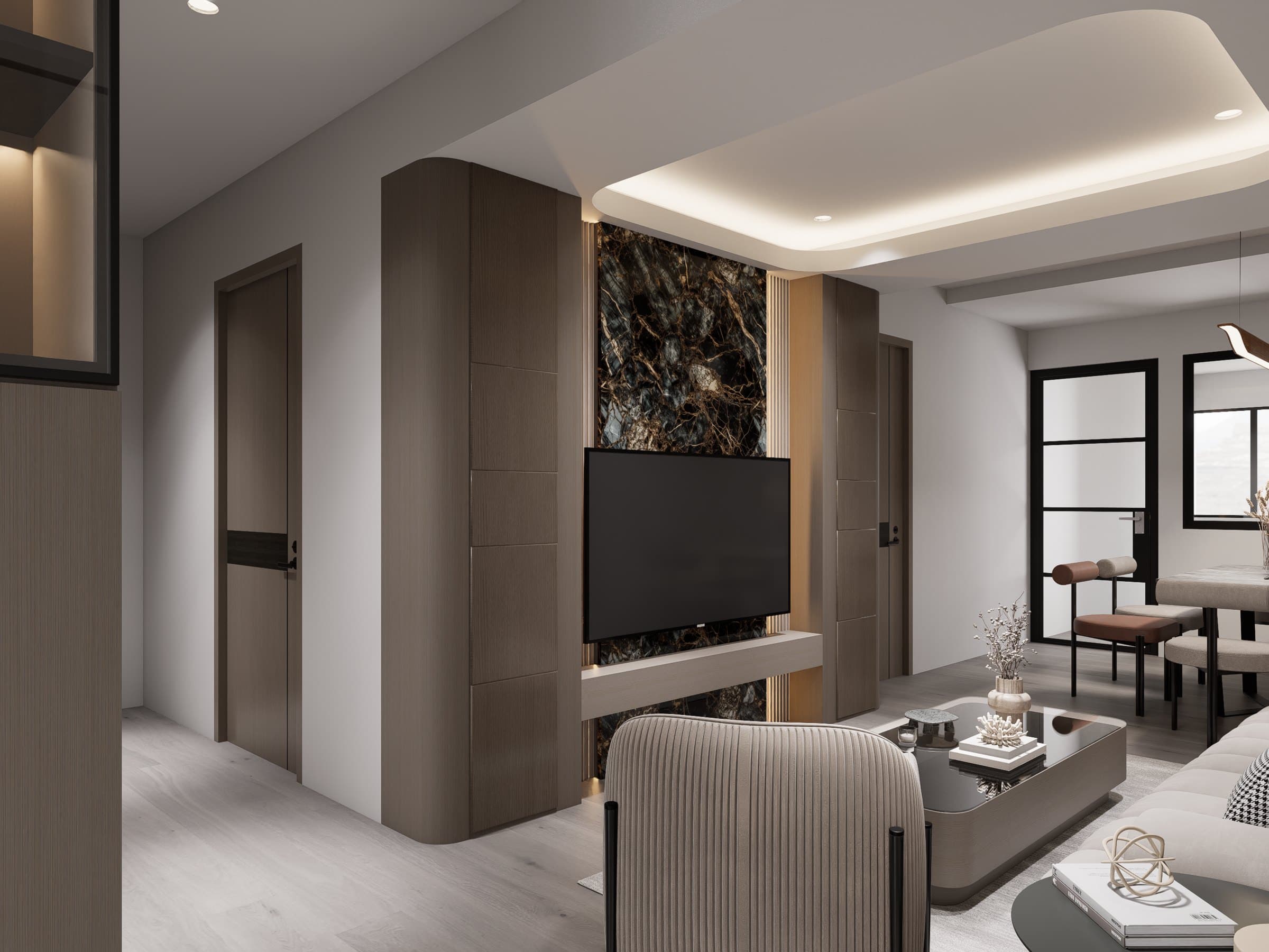 A living room framed by a feature wall and curved seating, with soft cove lighting overhead.