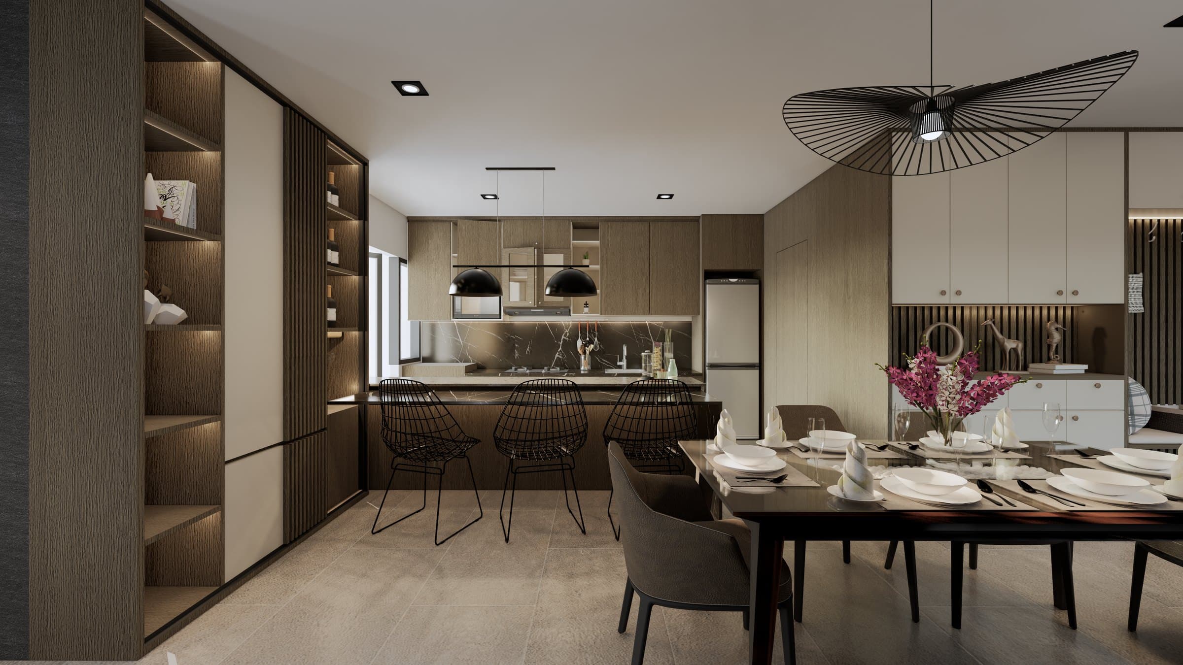 A kitchen-and-dining room sharing a single open volume, with quartz counters and warm pendant lighting overhead.