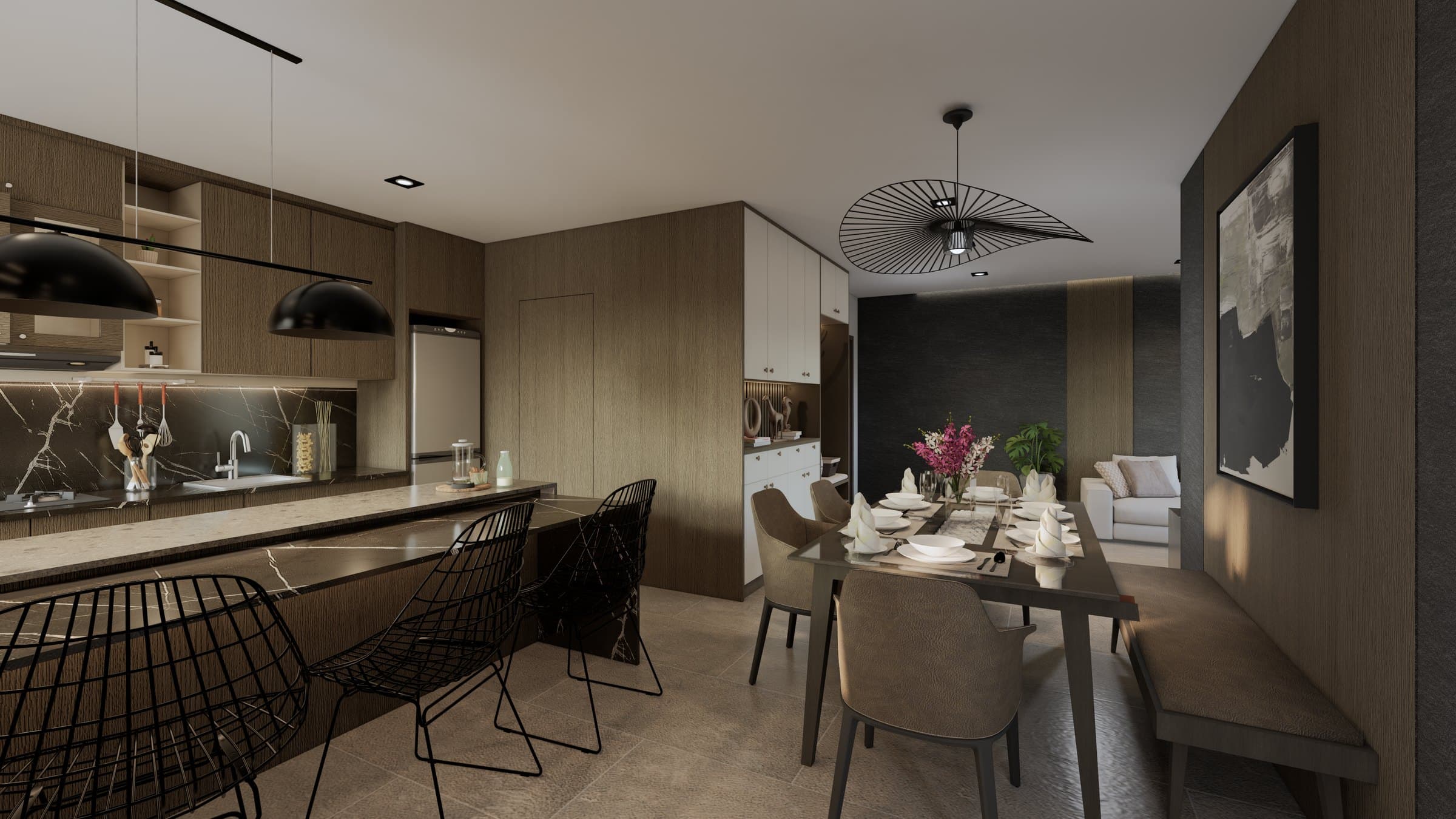 A kitchen-and-dining room sharing a single open volume, with quartz counters and warm pendant lighting overhead.
