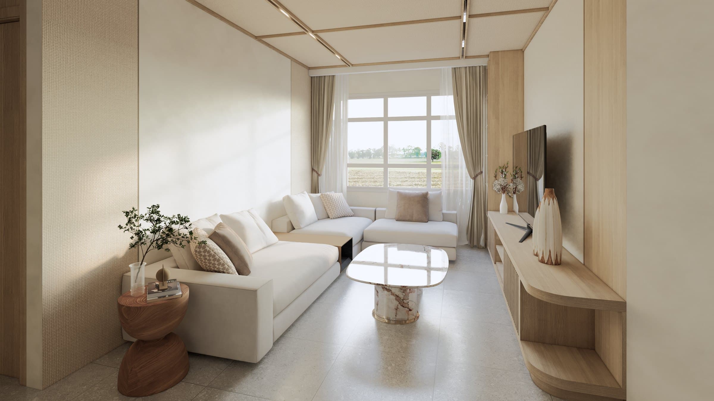 A living room arranged around a sectional sofa and feature TV wall, with cove lighting and tonal styling.