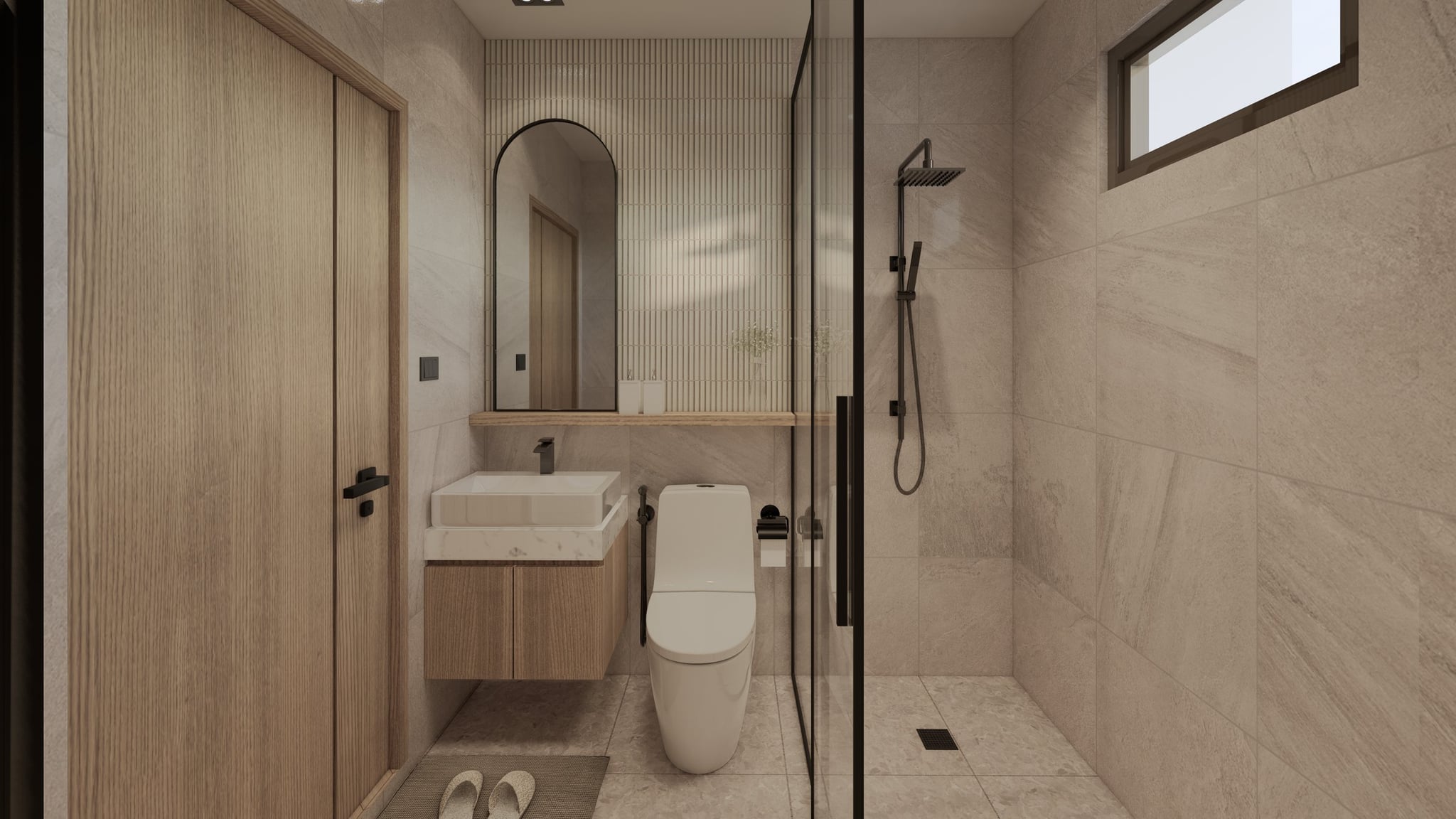 A bathroom in tonal tile, finished with a wall-hung vanity, glass shower screen and warm overhead lighting.
