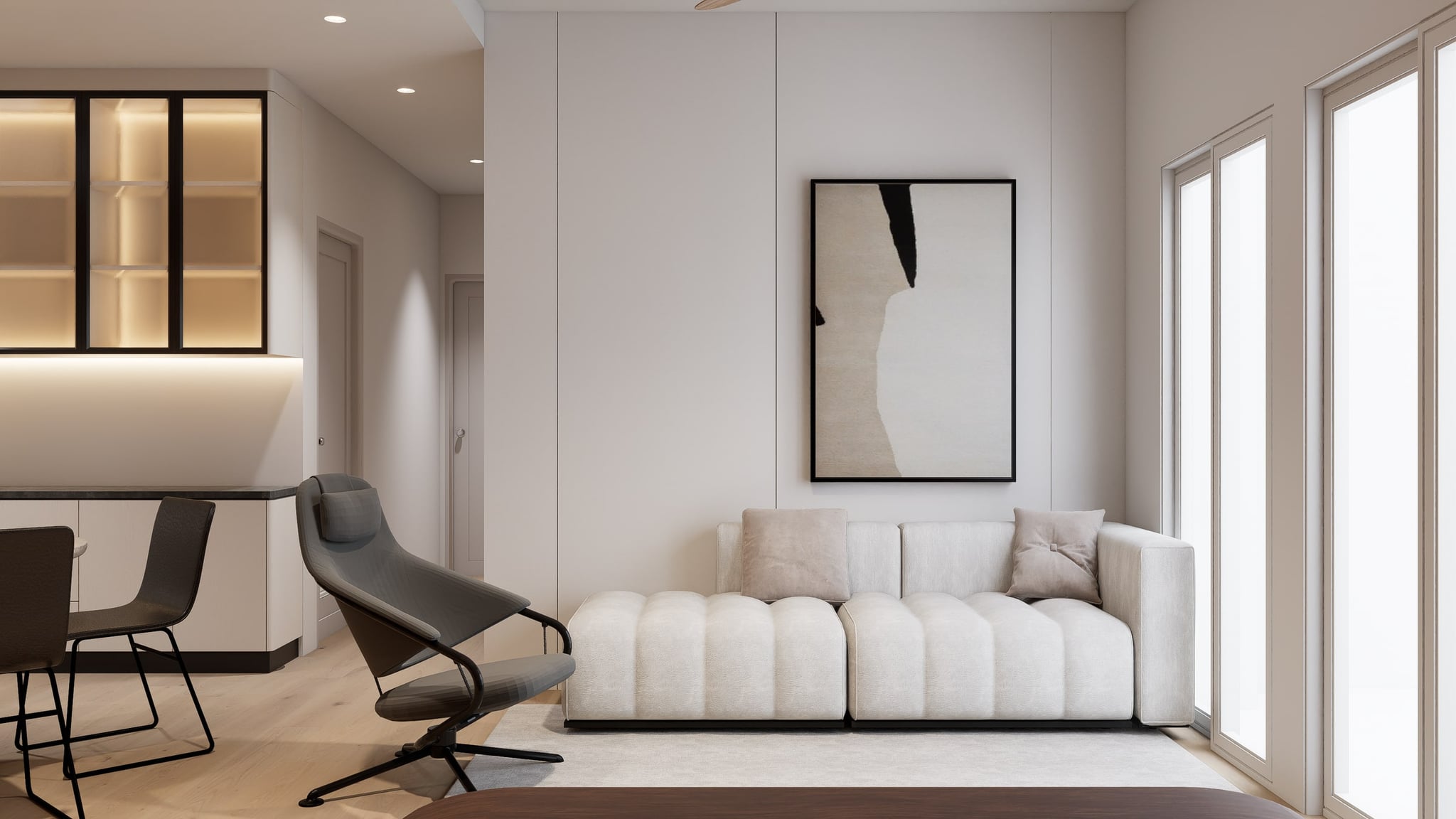 A living area in soft cream and pale oak, anchored by a low modular sofa and framed by full-height windows.