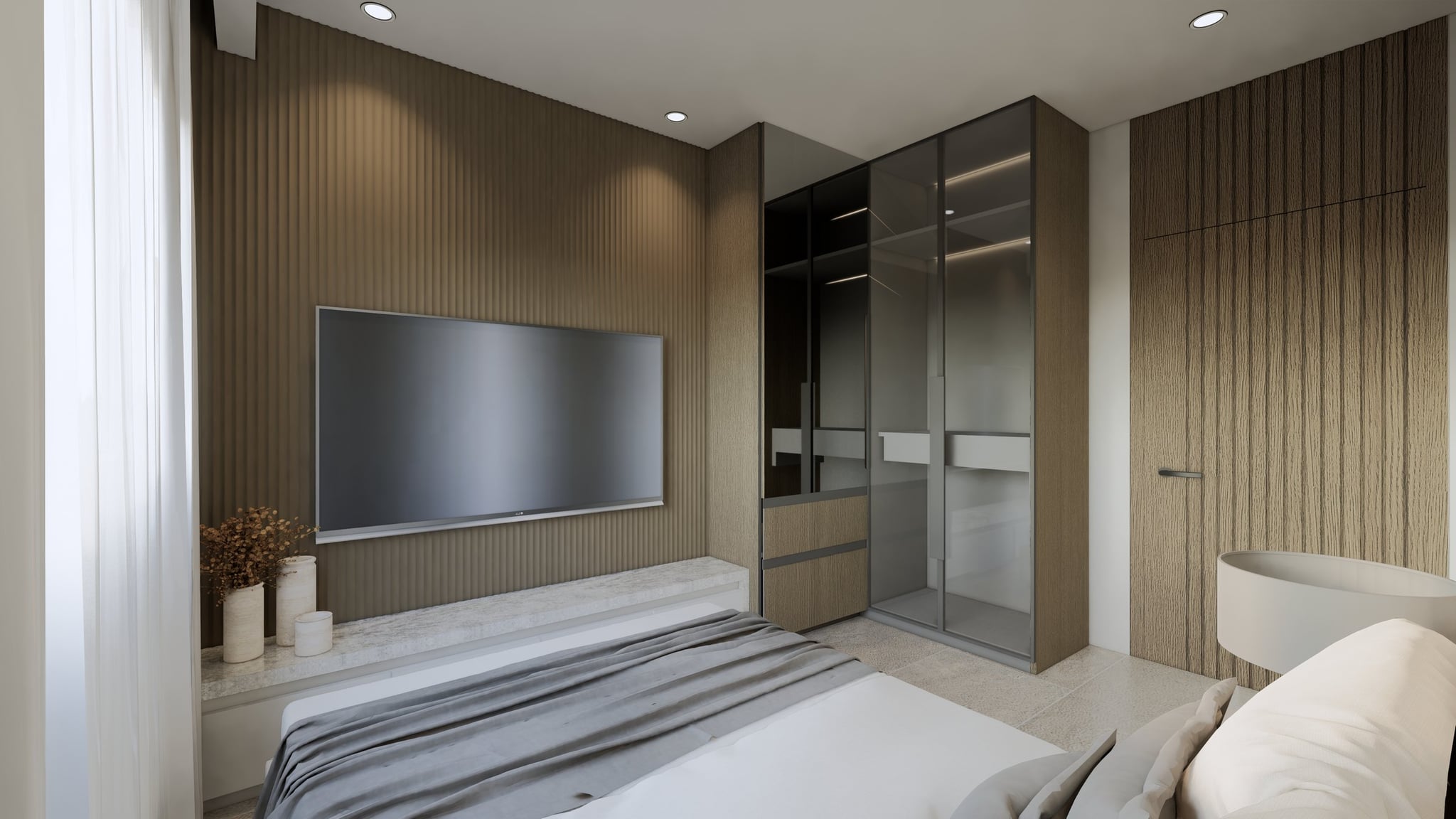 A bedroom in a calm tonal palette, dressed with a platform bed, built-in wardrobe and quiet bedside styling.